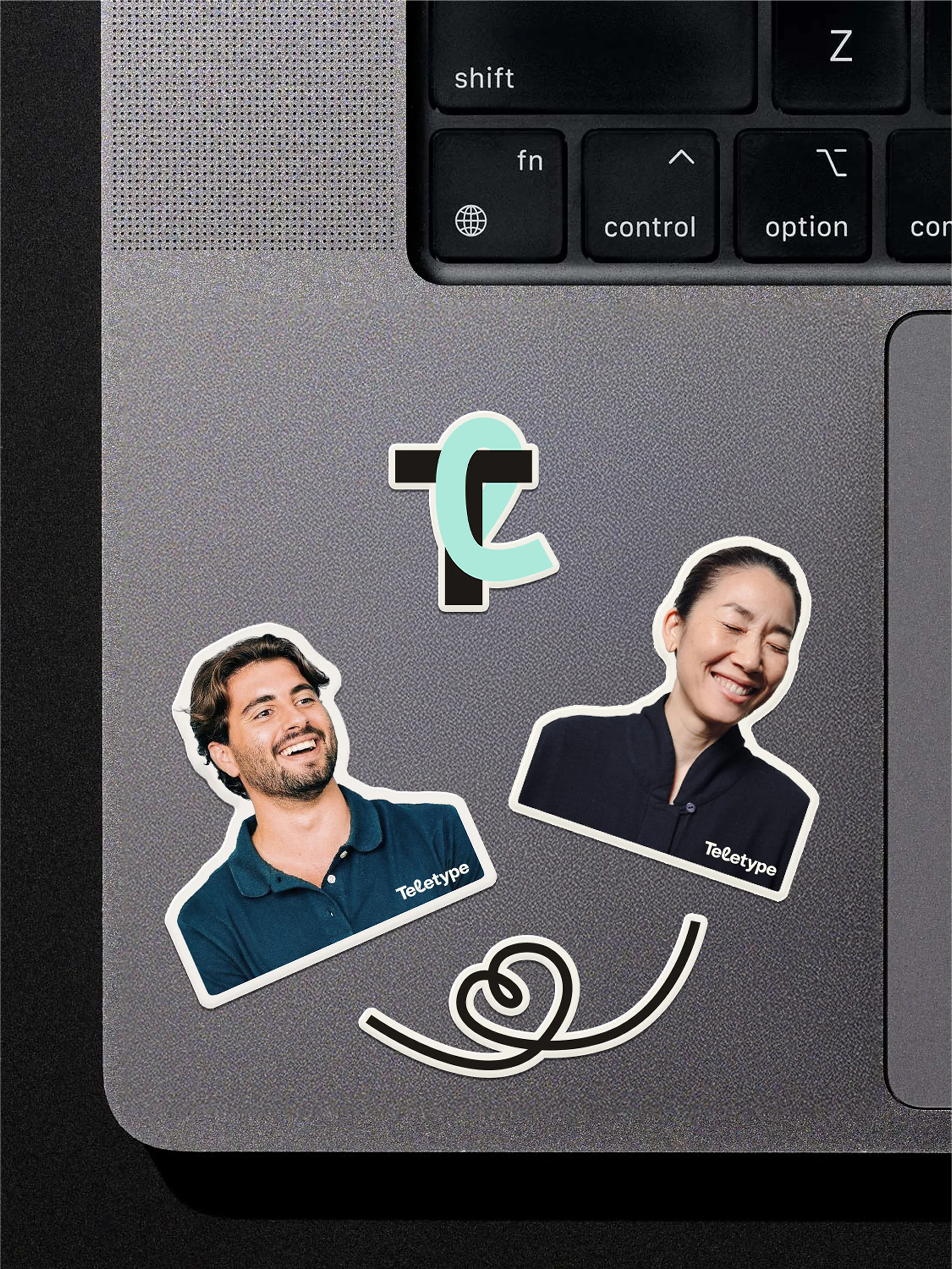 Стикеры Teletype на ноутбуке